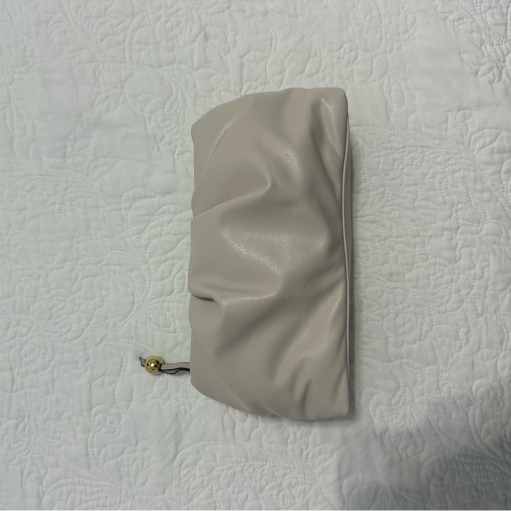 Elegant Beige Clutch with Gold Accent